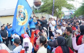 Warga antusias mengikuti kegiatan Car Free Day (CFD) perdana di Jalan Sumatera, Medan Belawan, Minggu (2/8/2026).