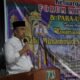 Pj Sekda Medan Erfin Fahrurrazi membacakan sambutan Wali Kota Rico Waas pada peringatan Maulid Nabi bersama Forum Minang Sati.